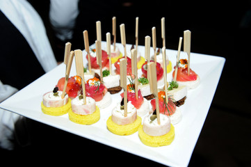 hands holding plates