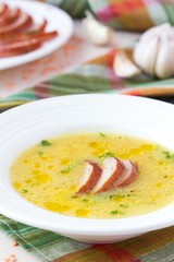 Cream soup of red lentil with smoked meat, duck, chicken
