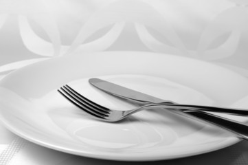 Knife and fork on a plate