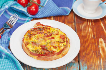 Breakfast Quiche. Smoked bacon, leek and roast garlic quiche