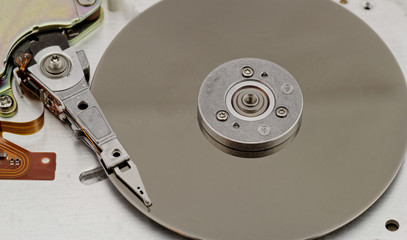 Open computer hard drive on white background