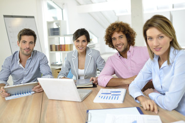 Business meeting around table