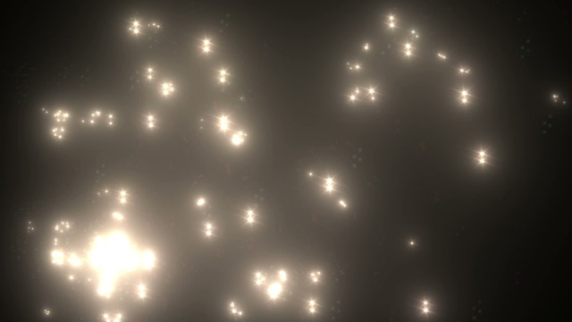 Many Light Flashes Effect Over Black Background