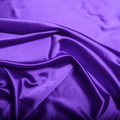 Purple silk background texture close up