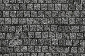 Granite cobblestoned pavement background.