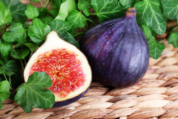 Ripe figs in leaves close-up