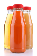 Baby food (juices) in glass jars, isolated on white
