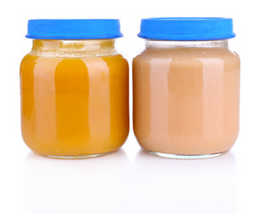 Baby food in glass jars, isolated on white