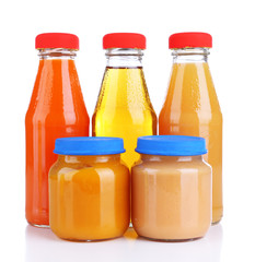 Baby food in glass jars, isolated on white