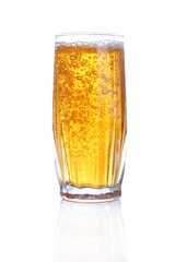 Juice pouring into glass isolated on white