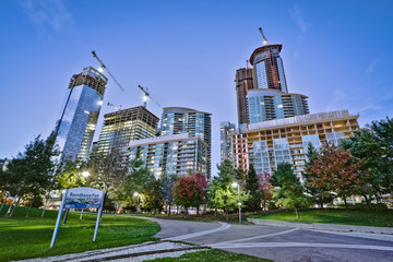 A park in downtown Toronto with high rise building © Aqnus