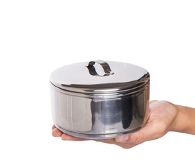 Female hand holding a stainless steel food container