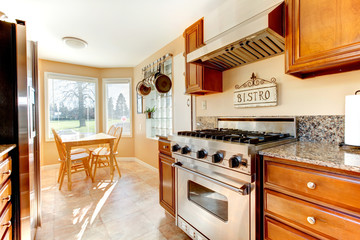 Cozy bright kitchen room with dining area