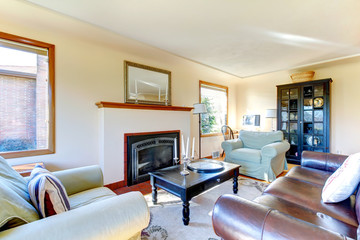 Bright furnished living room with fireplace