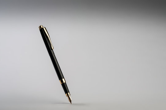 pen on notebook background