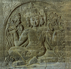 Carved sandstone figure of Hindu god in Bagan temple, Myanmar