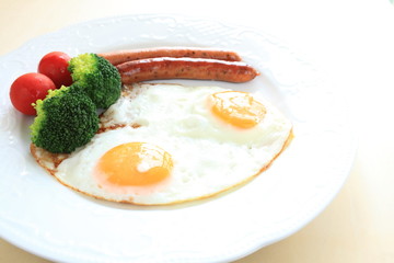 sunny side up egg and sausage for gourmet breakfast