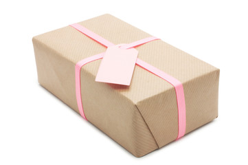 gift box with pink ribbon and label.