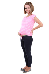Beautiful young pregnant woman isolated on white