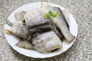 pieces of fresh cod in dish