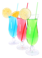 Glasses of cocktails isolated on white