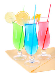 Glasses of cocktails isolated on white