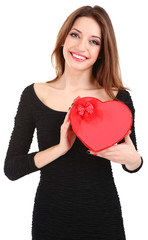 Attractive woman with gift box in form of heart, isolated