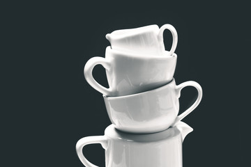 cups isolated on black