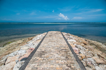 Stone path to the sea. Bali, Indonesia.