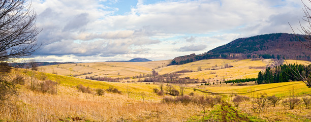 Landscape with autumnal meadows and hills - 60949221