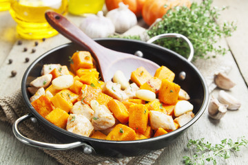 Chicken baked with pumpkin