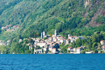 Fototapeta premium Town on Lake Como summer coast (Italy).