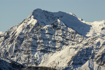 Snowy mountains and rocks at Gourette in the Pyrenees, France