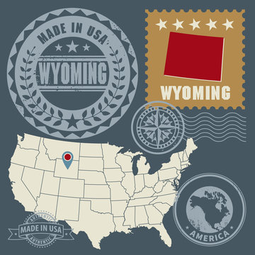 Abstract post stamps set with name and map of Wyoming, USA