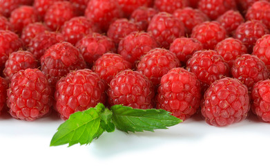 Ripe sweet raspberries isolated on white