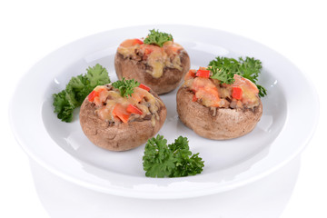 Stuffed mushrooms on plate isolated on white