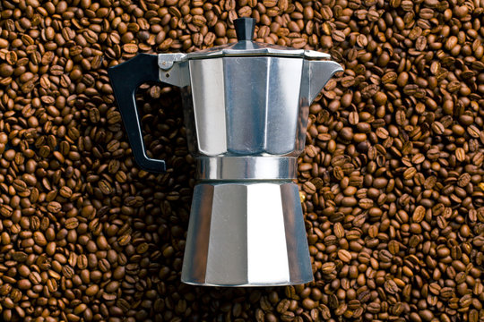 coffee maker on coffee beans