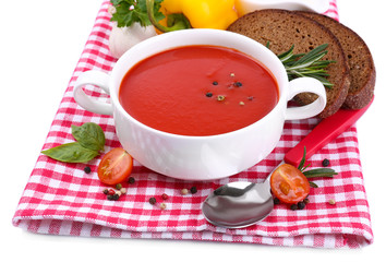 Tasty tomato soup and vegetables, isolated on white