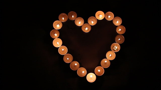 Heart shape made of candles