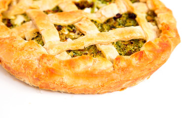 Vegetables pie with ricotta on white background