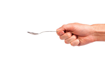 Hand is holding a spoon isolated