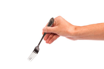 Right mans hand with empty metallic fork