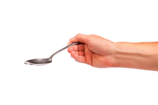 Hand Is Holding A Spoon Isolated