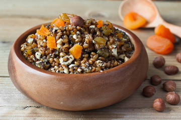 Sweet wheat kutia with nuts, poppy seeds, honey and dried fruits