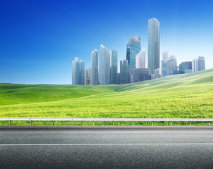 Obraz premium Asphalt road and modern city