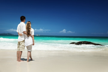 man and woman romantic couple on tropical beach