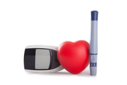 red heart with blood glucose meter