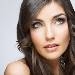 Obraz premium Woman face close up beauty portrait. Girl with long hair lookin