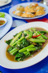 Fried kale and vegetables in oyster sauce