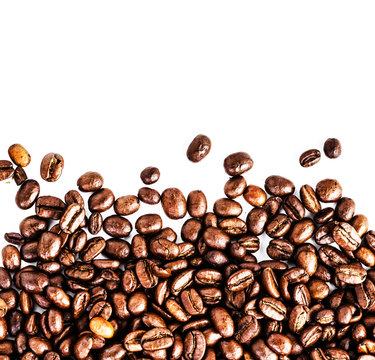 Brown roasted coffee beans isolated on white background.  Arabic